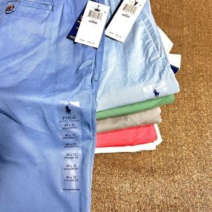 Various styles of Ralph lauren apparel sizes xl&xxl shirts 42-30 pants.
